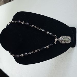 Distressed fashion necklace with adjustable length